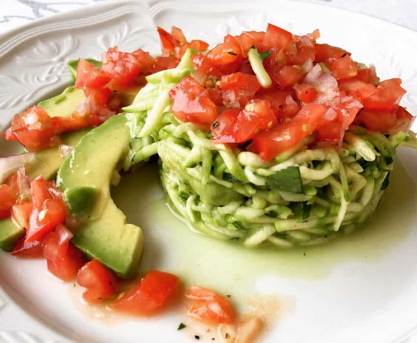 plated courgette salad with avocado and salsa